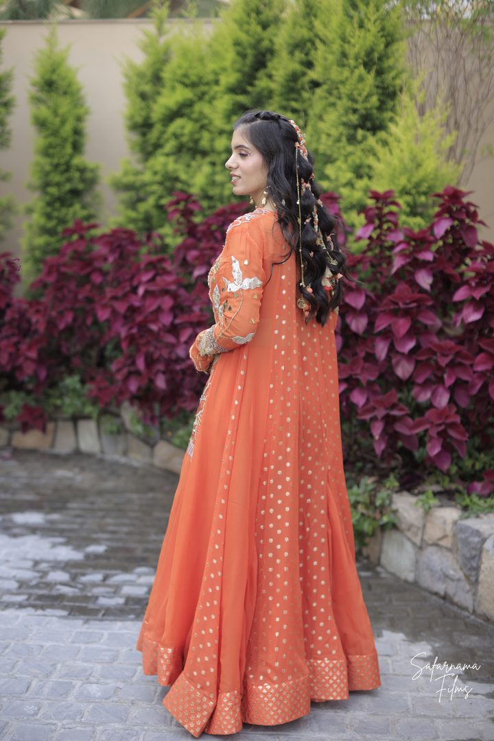 Tithi & Harshit in custom Narangi set and custom narangi men's set