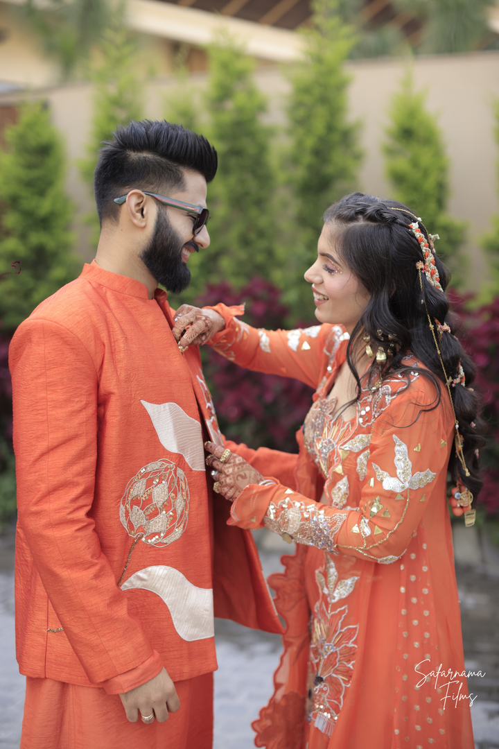 Tithi & Harshit in custom Narangi set and custom narangi men's set