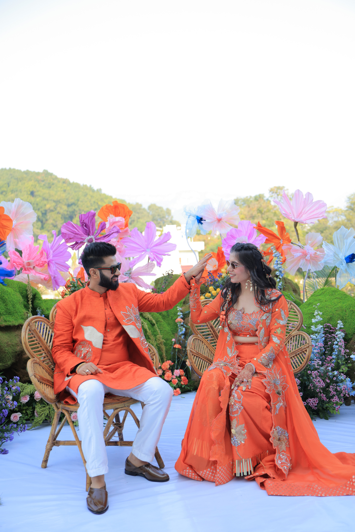 Tithi & Harshit in custom Narangi set and custom narangi men's set