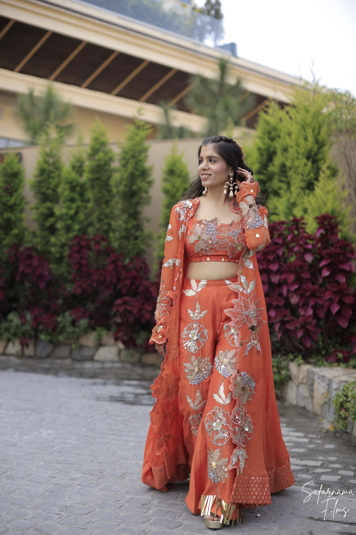 Tithi & Harshit in custom Narangi set and custom narangi men's set