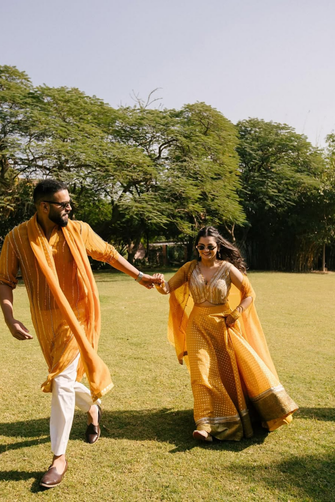 Medha & Beej in Mira Lehanga & Sunflower Kurta set