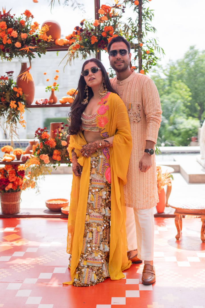 Minal & Nitin In Akira Sitara Yellow set and Peach Plum Mens set