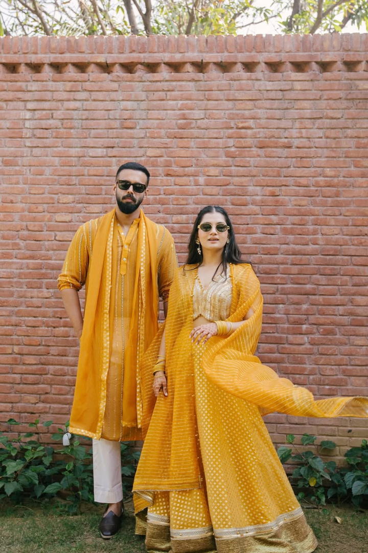 Medha & Beej in Mira Lehanga & Sunflower Kurta set