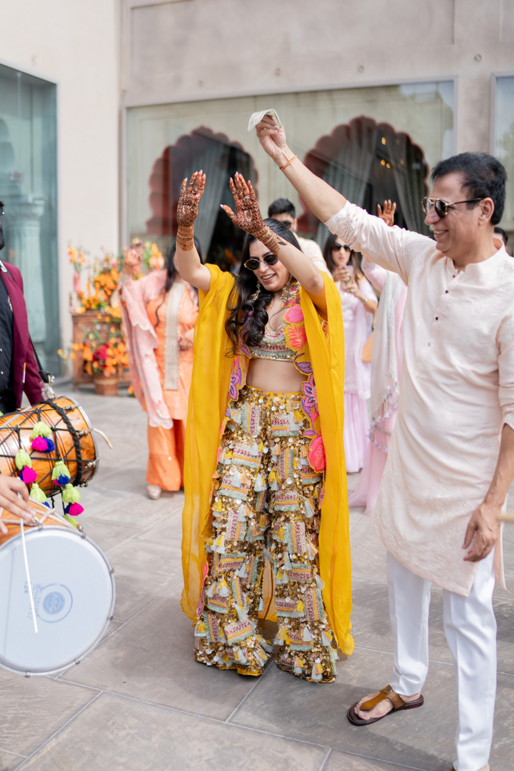 Minal & Nitin In Akira Sitara Yellow set and Peach Plum Mens set