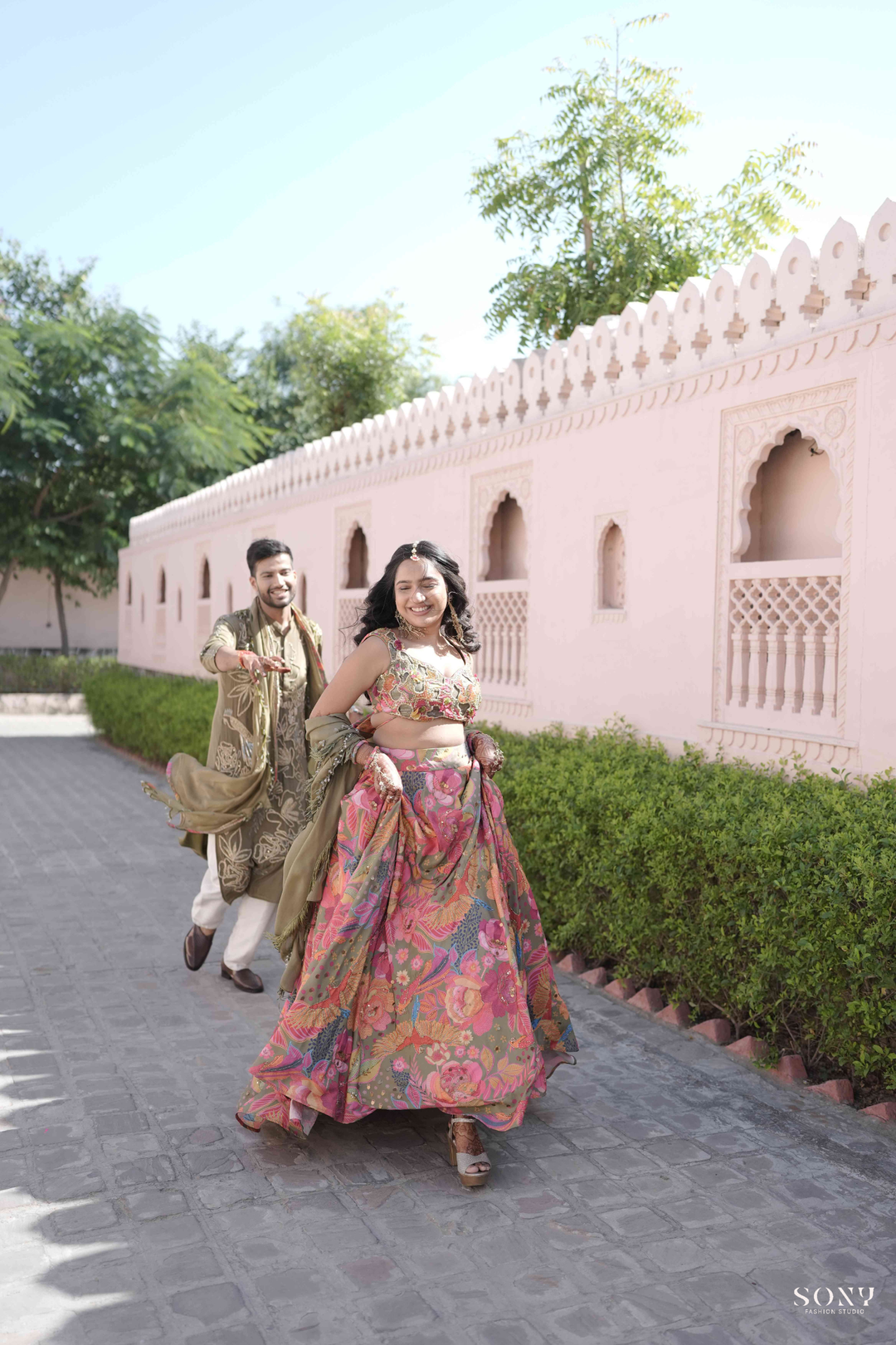 Pavani & Rishabh in Dhoom tana Lehenga & Olive mens Glam Kurta