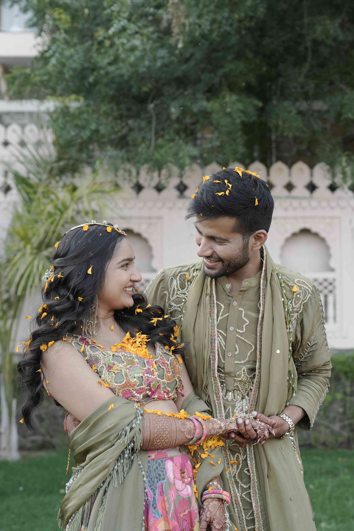 Pavani & Rishabh in Dhoom tana Lehenga & Olive mens Glam Kurta