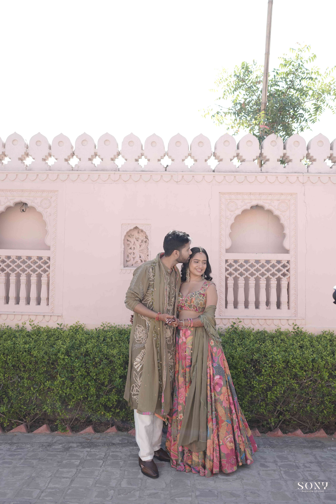 Pavani & Rishabh in Dhoom tana Lehenga & Olive mens Glam Kurta