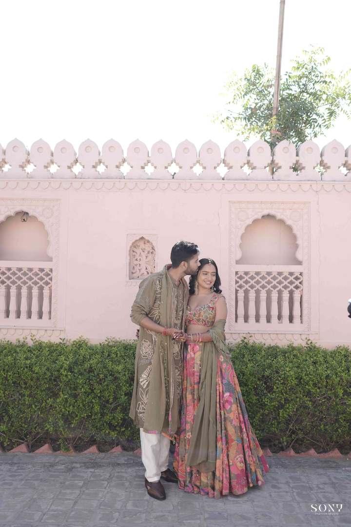 Pavani & Rishabh in Dhoom tana Lehenga & Olive mens Glam Kurta