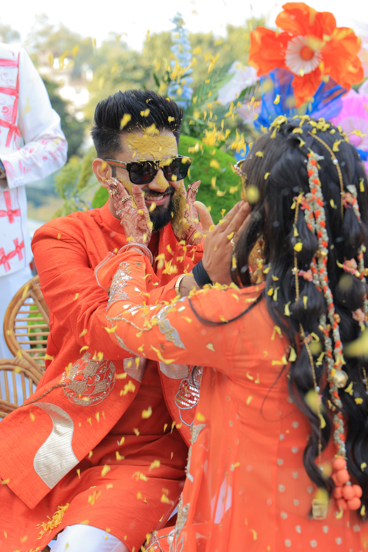 Tithi & Harshit in custom Narangi set and custom narangi men's set