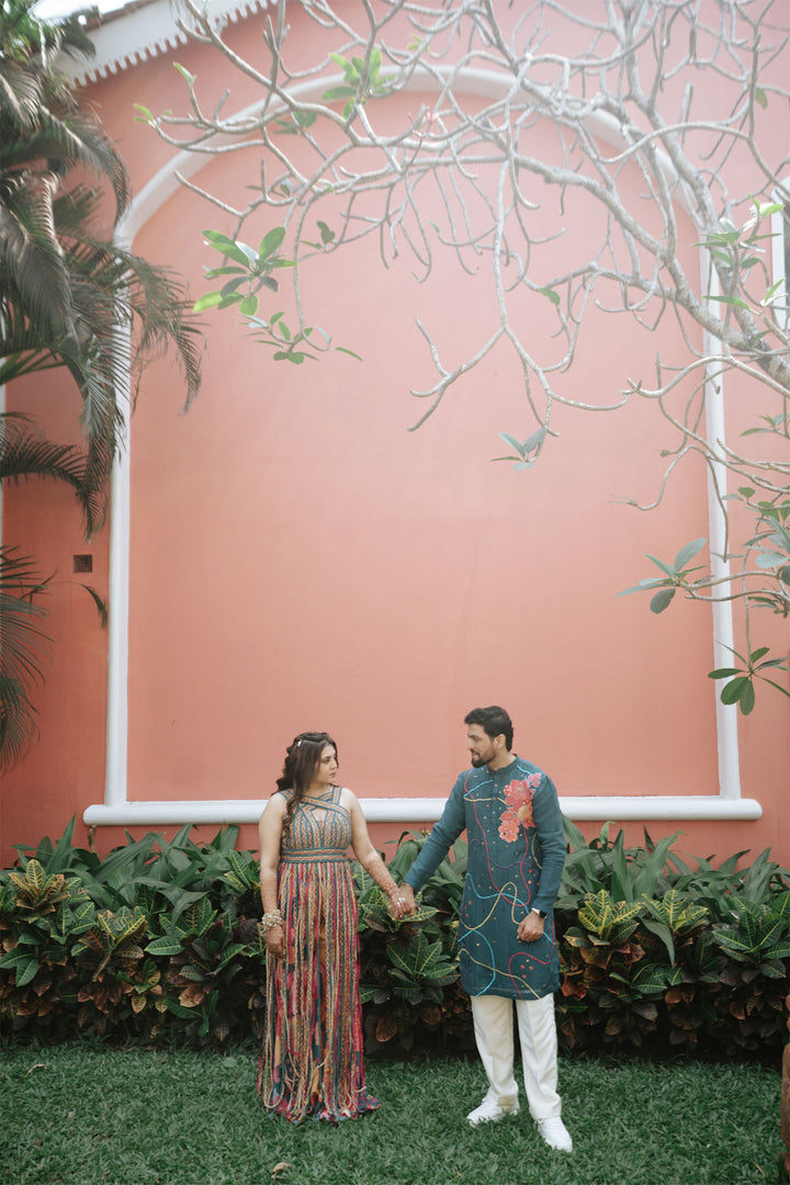 Dhun and Vineet in teal cascade & Teal chulbul kurta