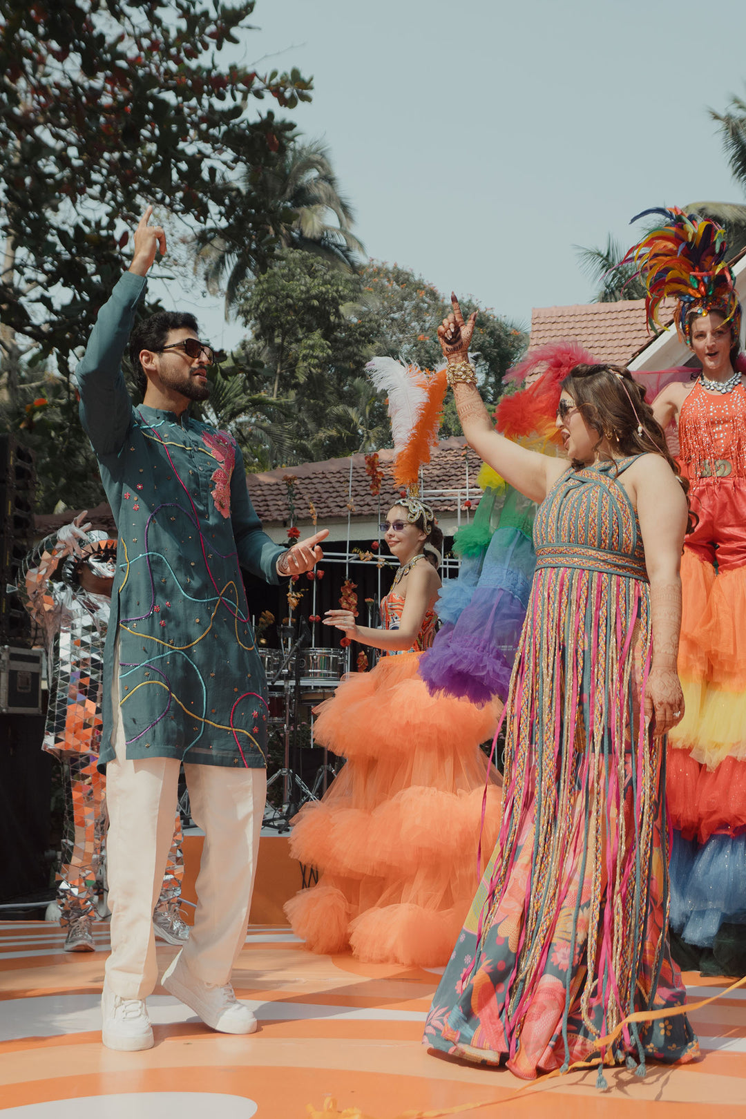 Dhun and Vineet in teal cascade & Teal chulbul kurta