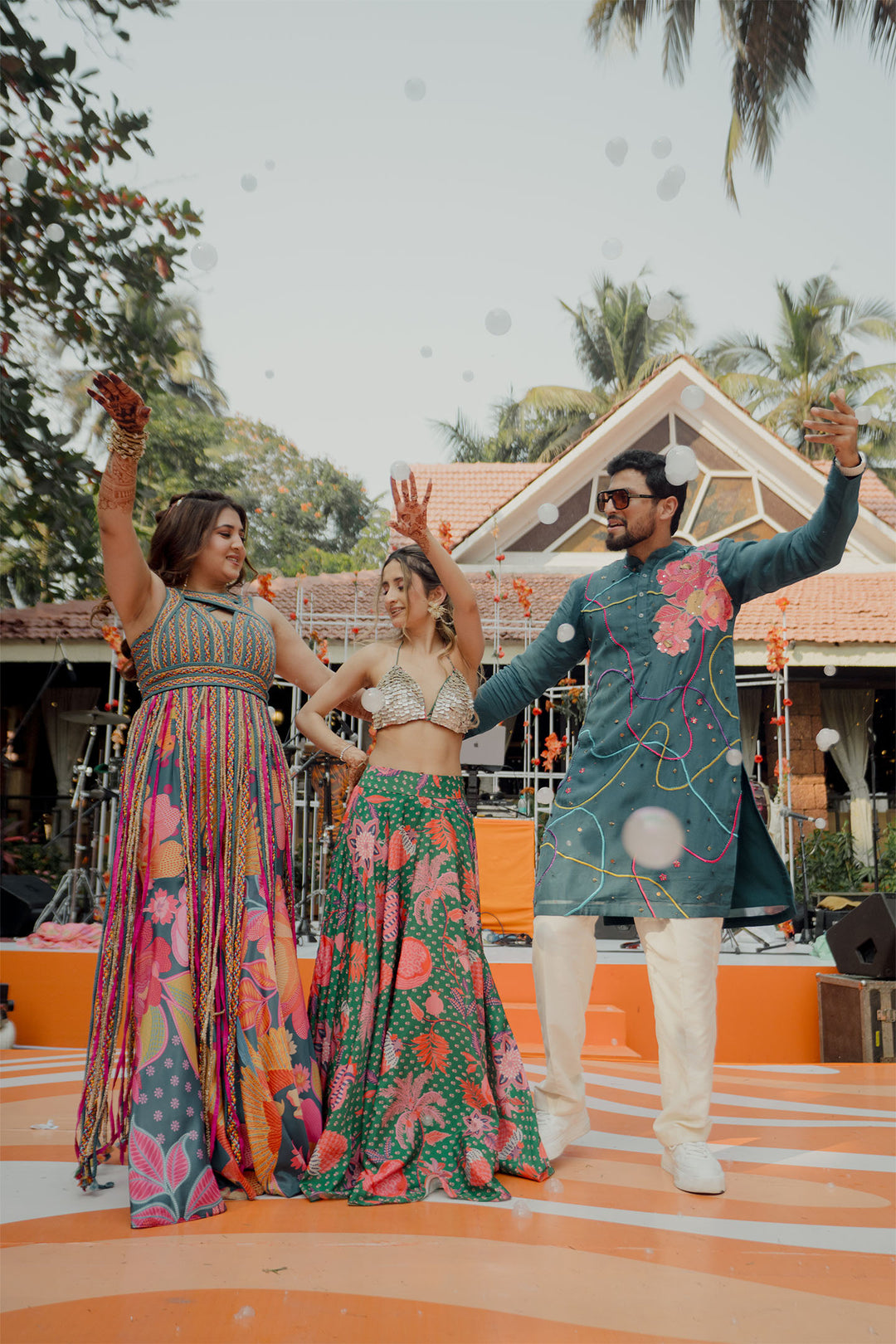 Dhun and Vineet in teal cascade & Teal chulbul kurta