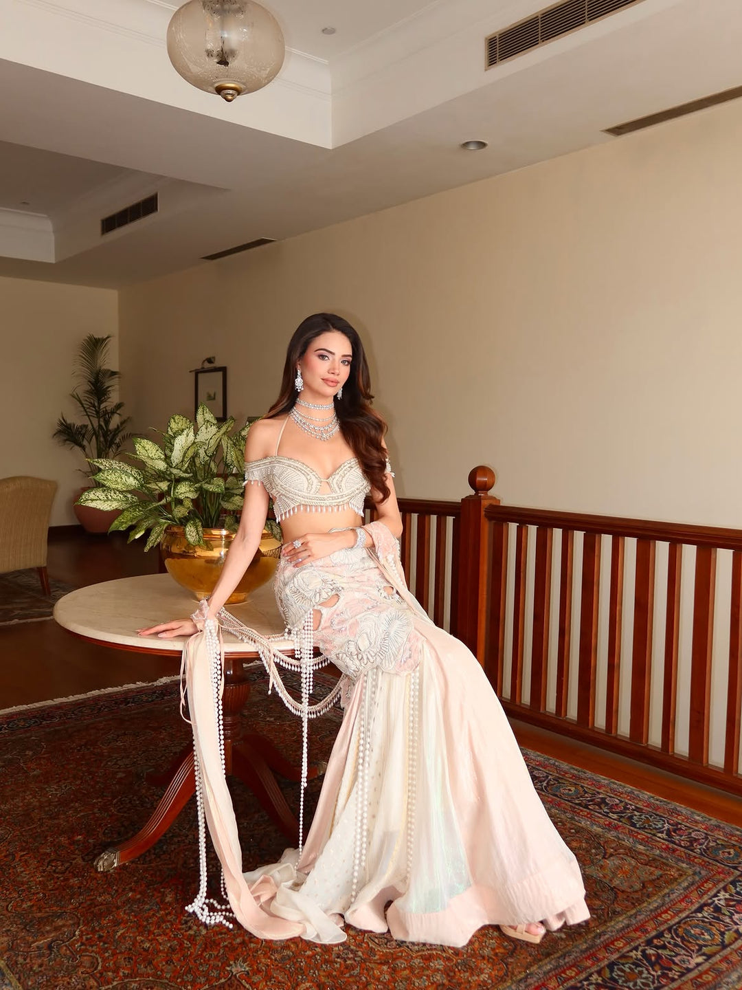 Ines in Ebony Ivory Lehanga